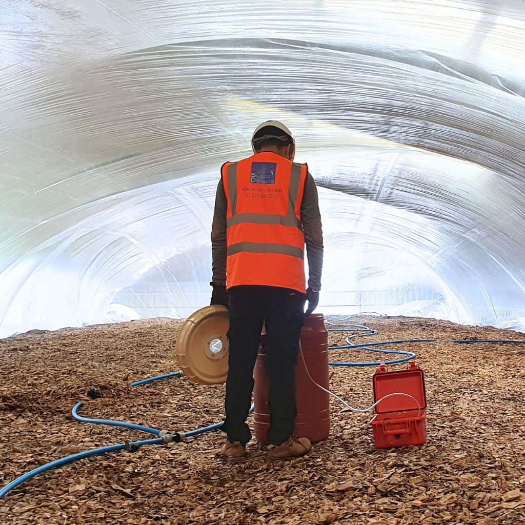 Dhruv Joshi, Odour Consultant at Silsoe Odours, conducts biofilter odour sampling using the sheet cover method.